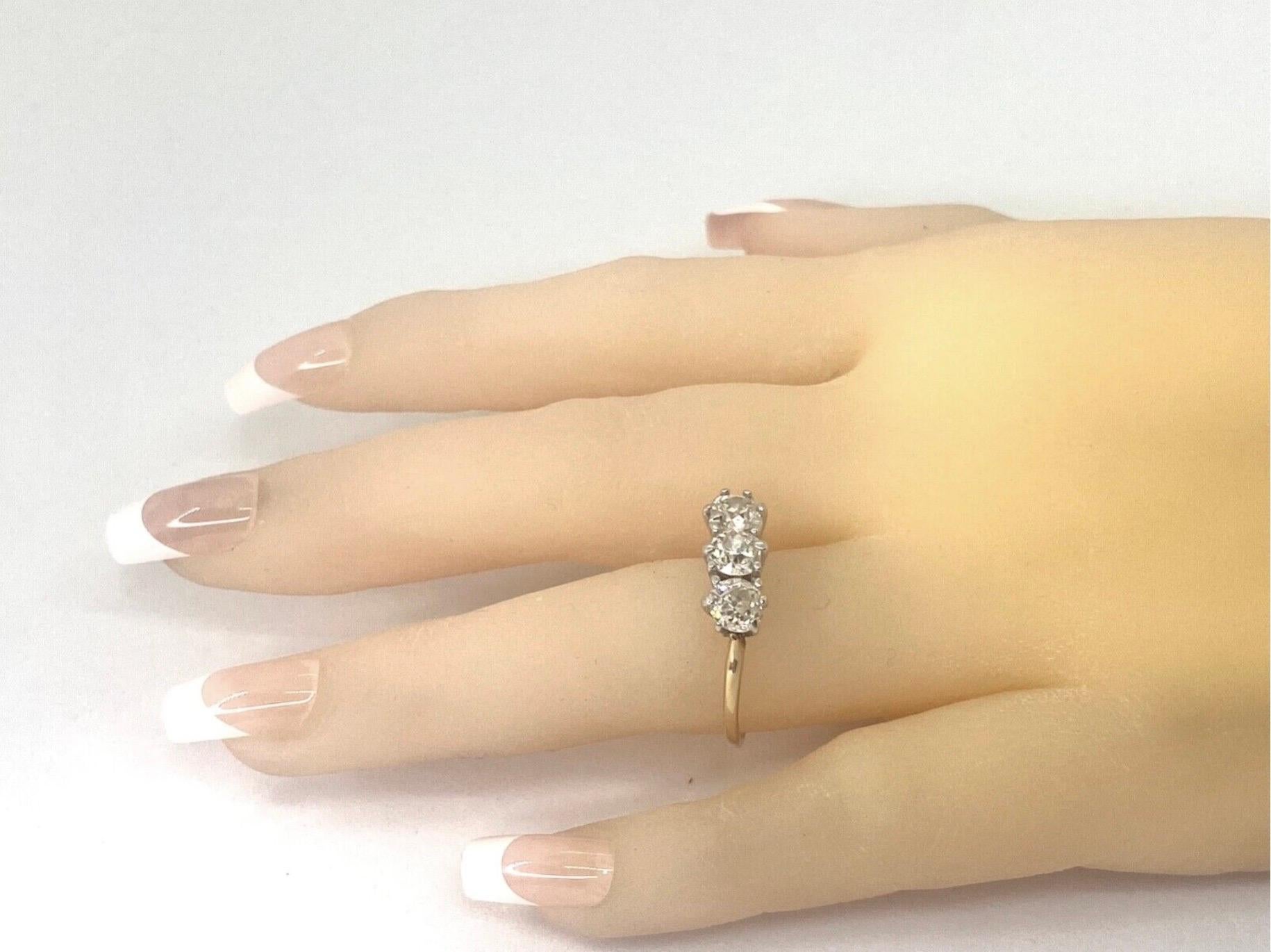Round Cut Edwardian Diamond 1.50 Carat Three-Stone Ring For Sale