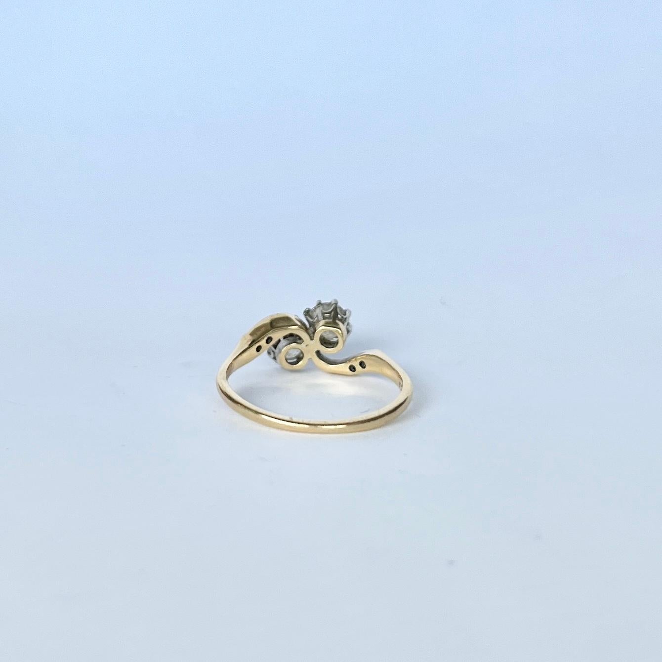 Edwardian Diamond 18 Carat Gold and Platinum Cross Over Ring In Good Condition For Sale In Chipping Campden, GB