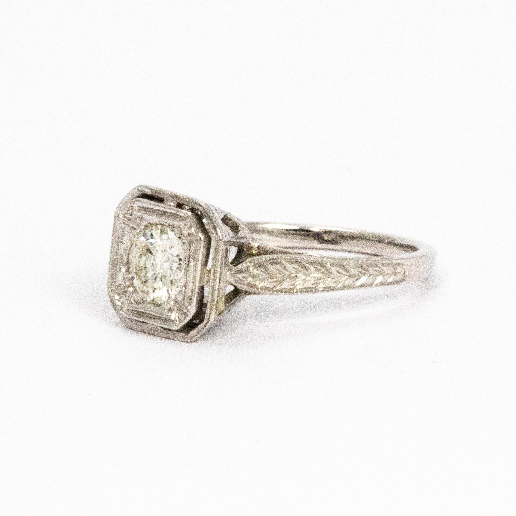 Stunning diamond ring with plenty of beautiful detail made from 18ct white gold. From the setting to the shoulders this ring is packed with glittering beauty. The diamond measures 50pts. 

Ring Size: I or 4 1/4