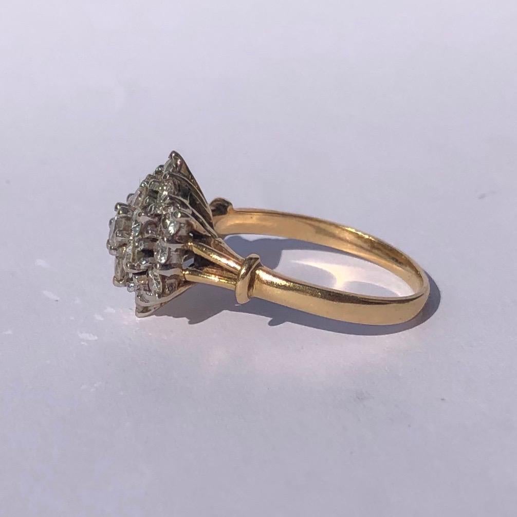 This cluster ring holds Diamonds totalling approx 1ct and are bright and sparkly. The stones are placed up high on an open work gallery, they are also set in platinum. 

Ring Size: N or 6 3/4 
Height From Finger: 8mm

Weight: 4.5g