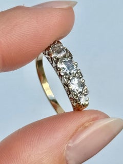 Edwardian Diamond and 18 Carat Gold Five-Stone Band Ring