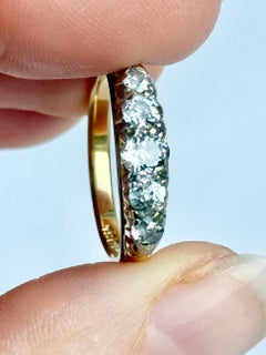 Anello edoardiano con diamante e oro 18 carati a cinque pietre
