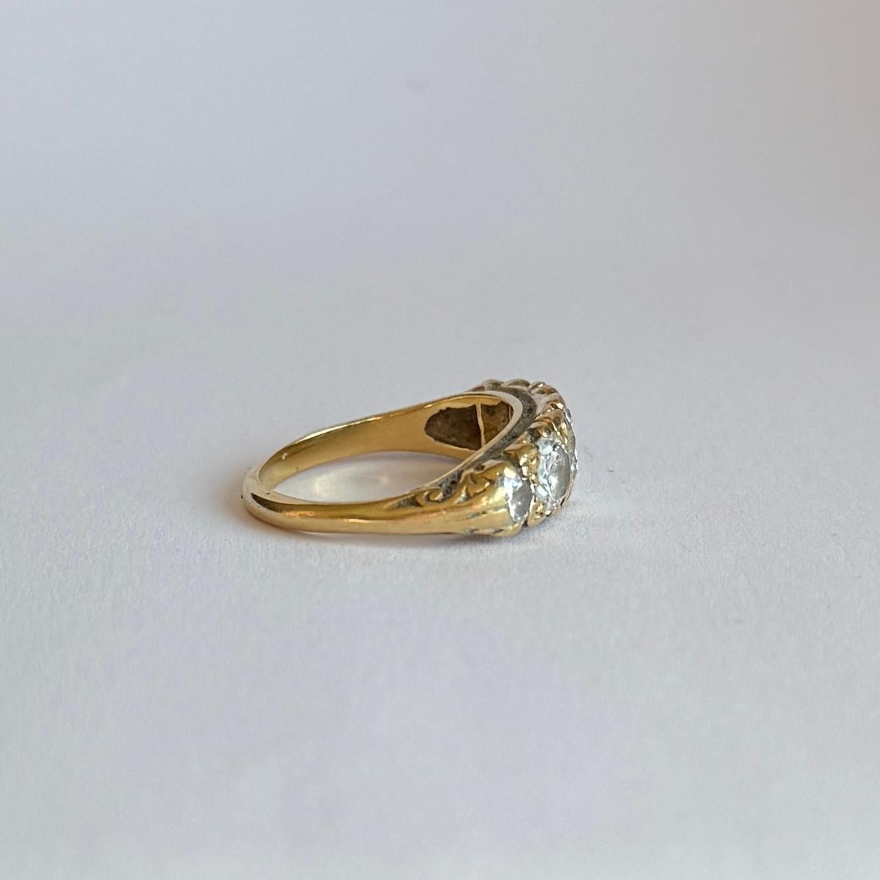 Women's or Men's Edwardian Diamond and 18 Carat Gold Five-Stone Band Ring