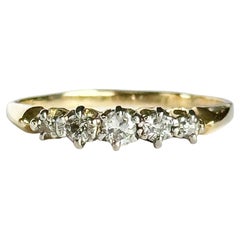 Edwardian Diamond and 18 Carat Gold Five-Stone Band Ring