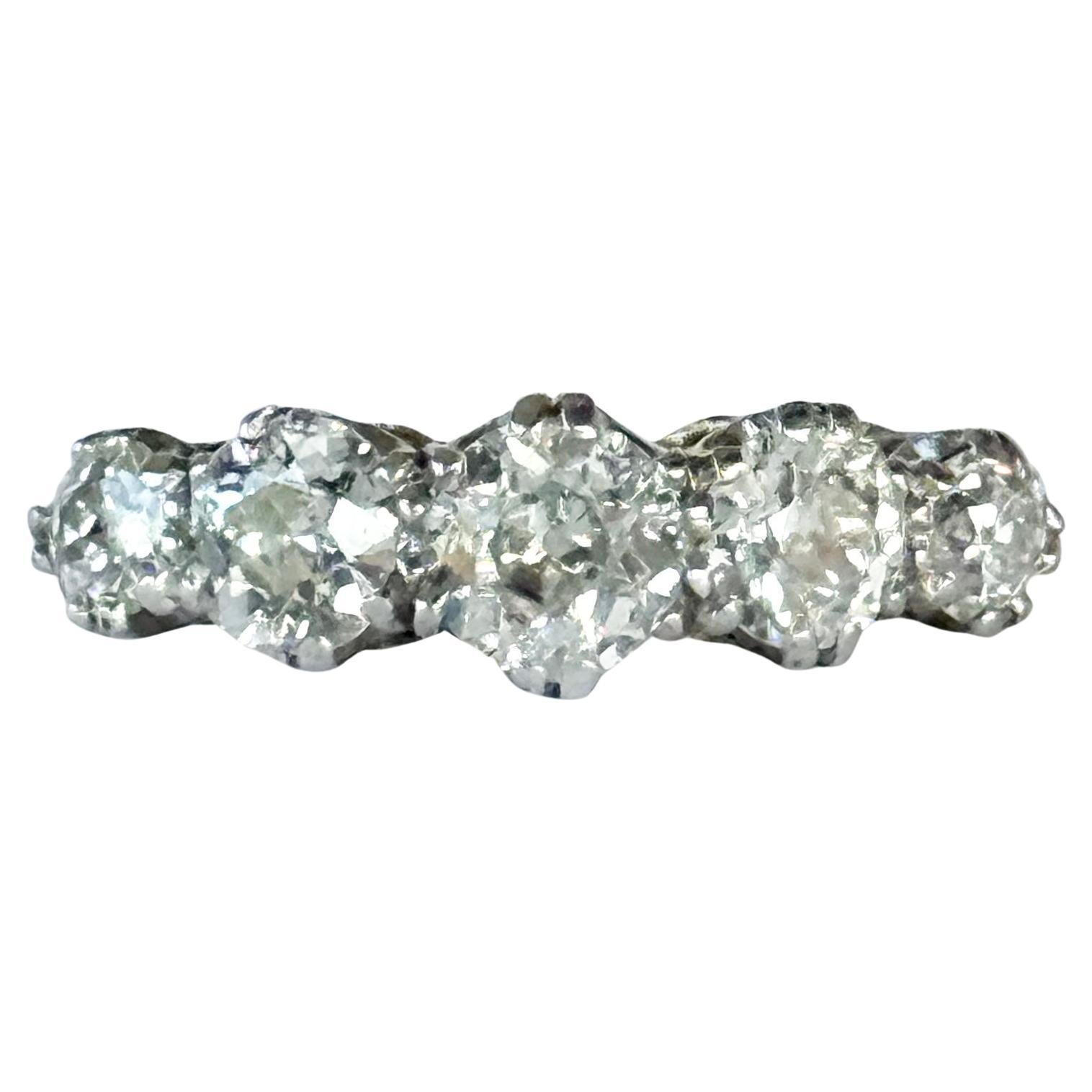Anello edoardiano con diamante e oro 18 carati a cinque pietre