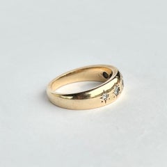 Edwardian Diamond and 18 Carat Gold five-Stone Star Setting Band