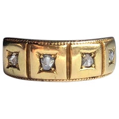 Edwardian Diamond and 18 Carat Gold Four Stone Band