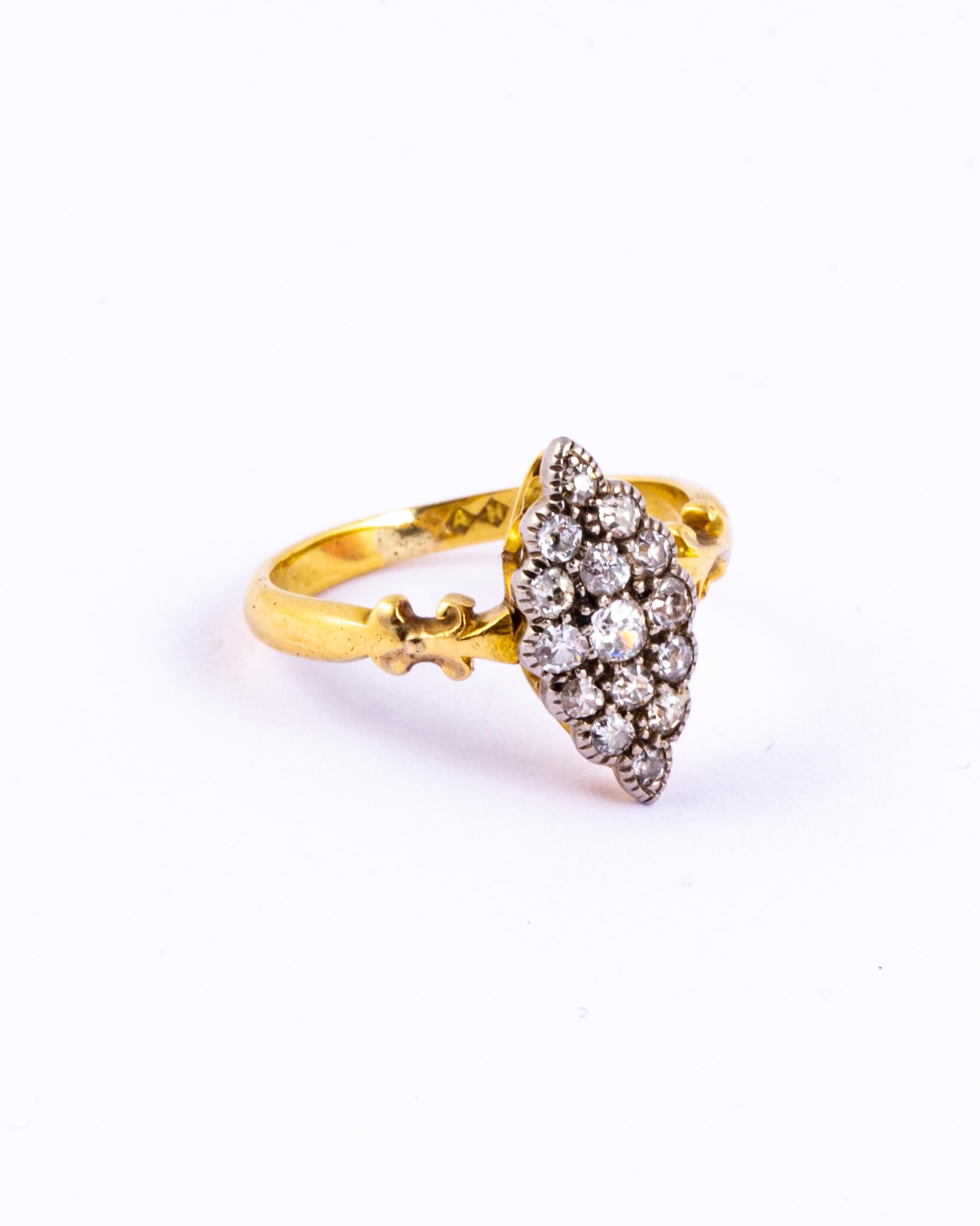 The style of this Edwardian ring is stunning. Each diamond is clean and bright and has gorgeous sparkle. The diamonds total approx 80pts and the shoulders are delicate scrolls. 

Size: J or 4 3/4 
Dimensions: 15x7mm

Weight: 2.67g