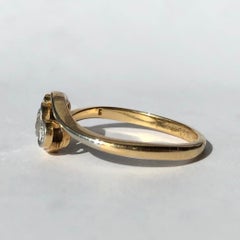 Edwardian Diamond and 18 Carat Gold Three-Stone Cross over Ring