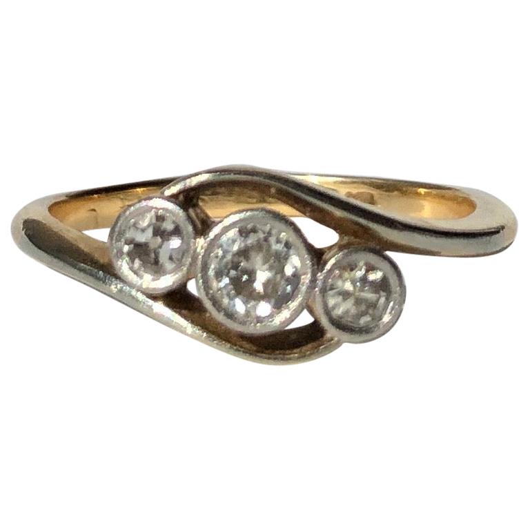 Edwardian Diamond and 18 Carat Gold Three-Stone Cross over Ring For Sale