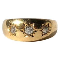Edwardian Diamond and 18 Carat Gold Three-Stone Gypsy Band Antique Edwardian Diamond and 18 Carat Gold Three-Stone Gypsy Band