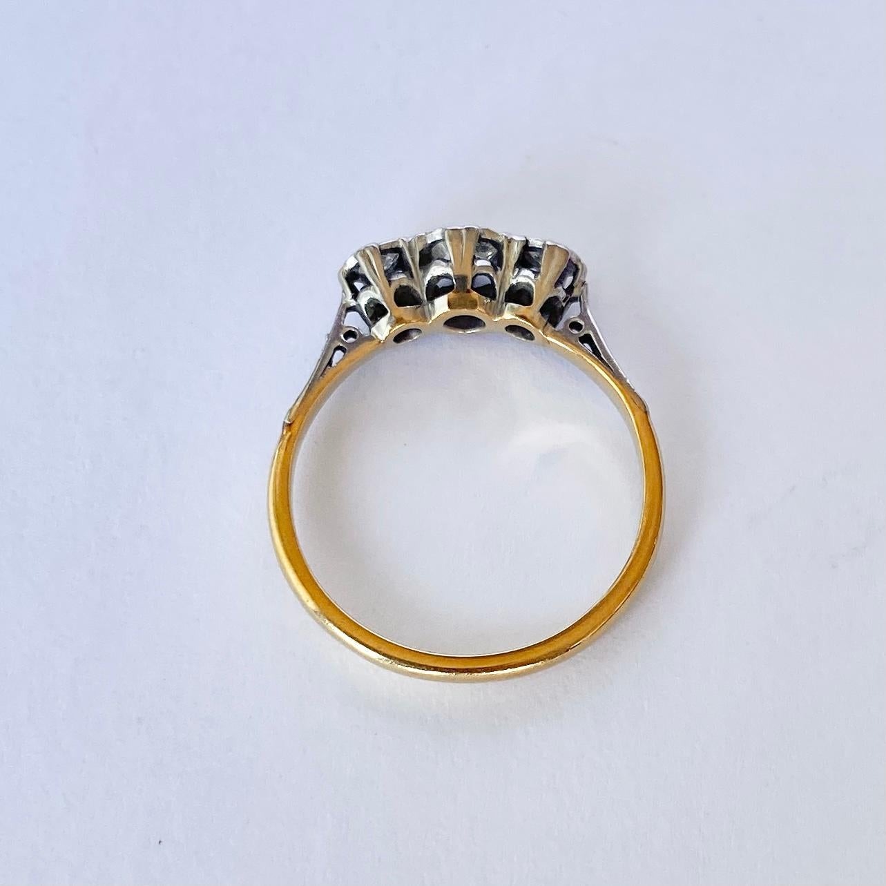 Round Cut Edwardian Diamond and 18 Carat Gold Three-Stone Ring For Sale