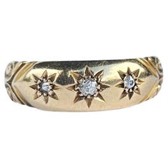 Edwardian Diamond and 18 Carat Gold Three-Stone Star Setting Band