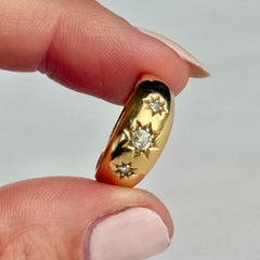 Edwardian Diamond and 18 Carat Gold Three-Stone Star Setting Ring