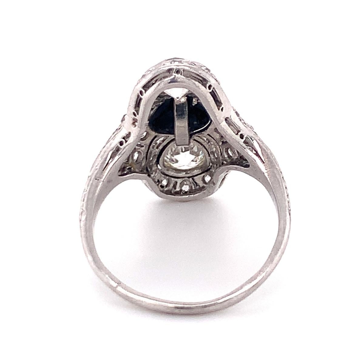 Edwardian Diamond and Onyx Filigree Platinum Ring, circa 1910 In Good Condition For Sale In Beverly Hills, CA