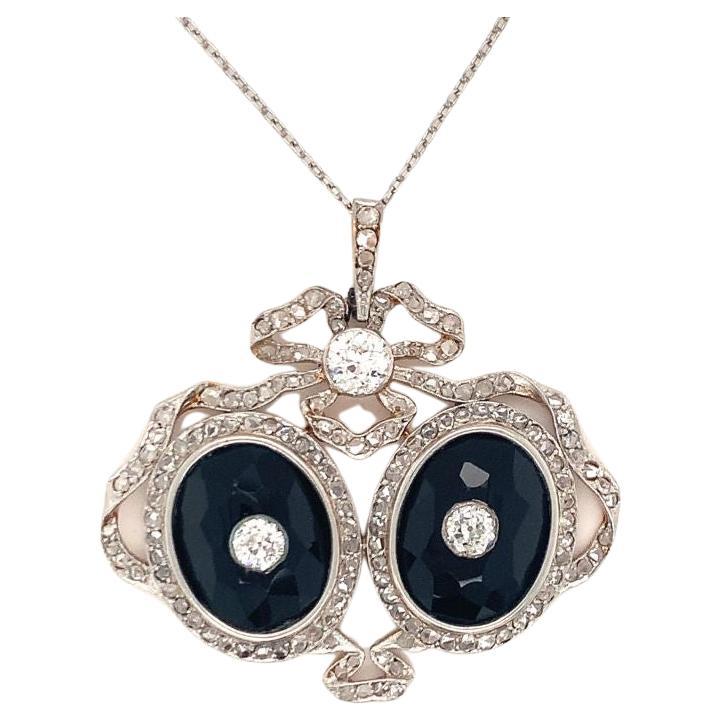 Edwardian Diamond and Onyx Platinum and 18k Yellow Gold Pendant, circa 1900s For Sale