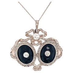 Vintage Edwardian Diamond and Onyx Platinum and 18k Yellow Gold Pendant, circa 1900s