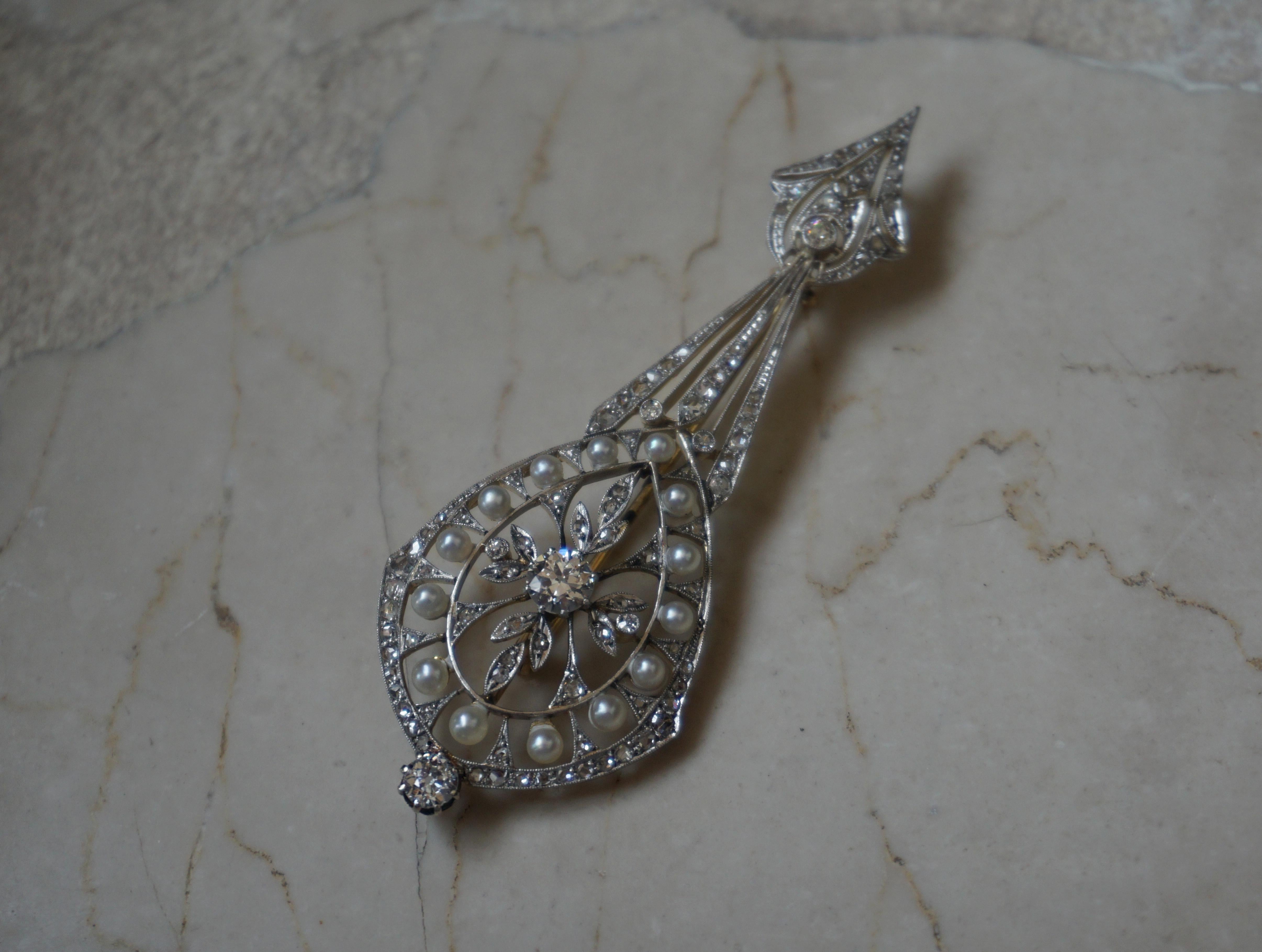 Antique Edwardian Circa 1900

Constructed of a combination of Platinum & 18 Karat Yellow Gold
(Platinum with an 18KT underbase layer)

Doubling as a Pin/Brooch or a Pendant

with a 17