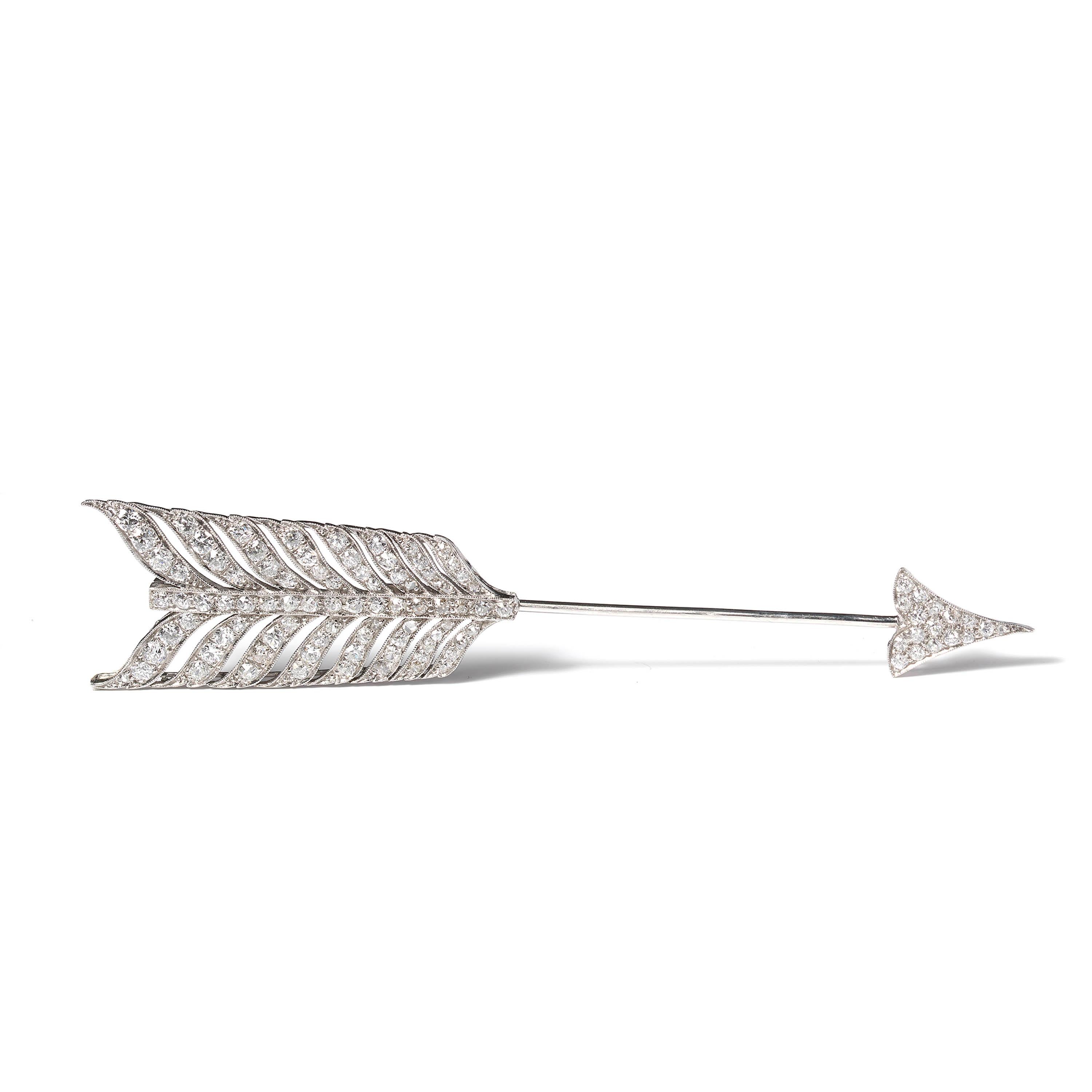 An Early 20th Century diamond set arrow jabot pin, set with old-cut, single-cut and rose-cut diamonds, weighing an estimated total of 4.40ct, mounted in platinum, circa 1910. Length 108mm