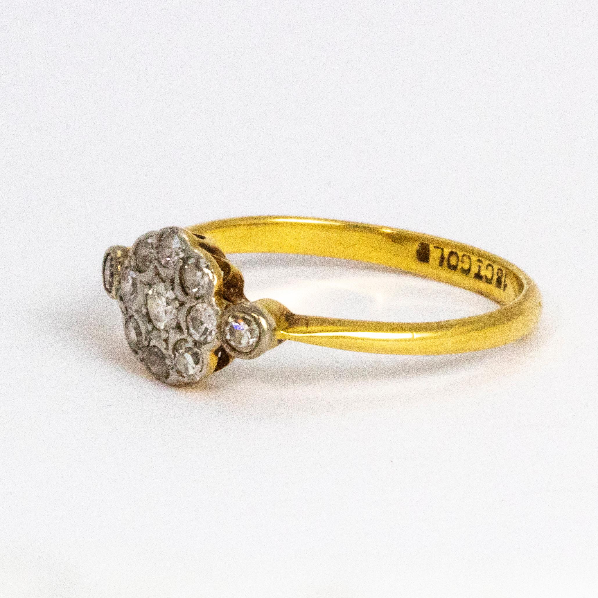 Charming diamond cluster ring holding a sparkling 10pt centre stone surrounded by a halo of eight .05pt diamonds and two .05pt diamond shoulders. Ring modelled in 18ct gold.

Ring Size: P 1/2 or 7 3/4
