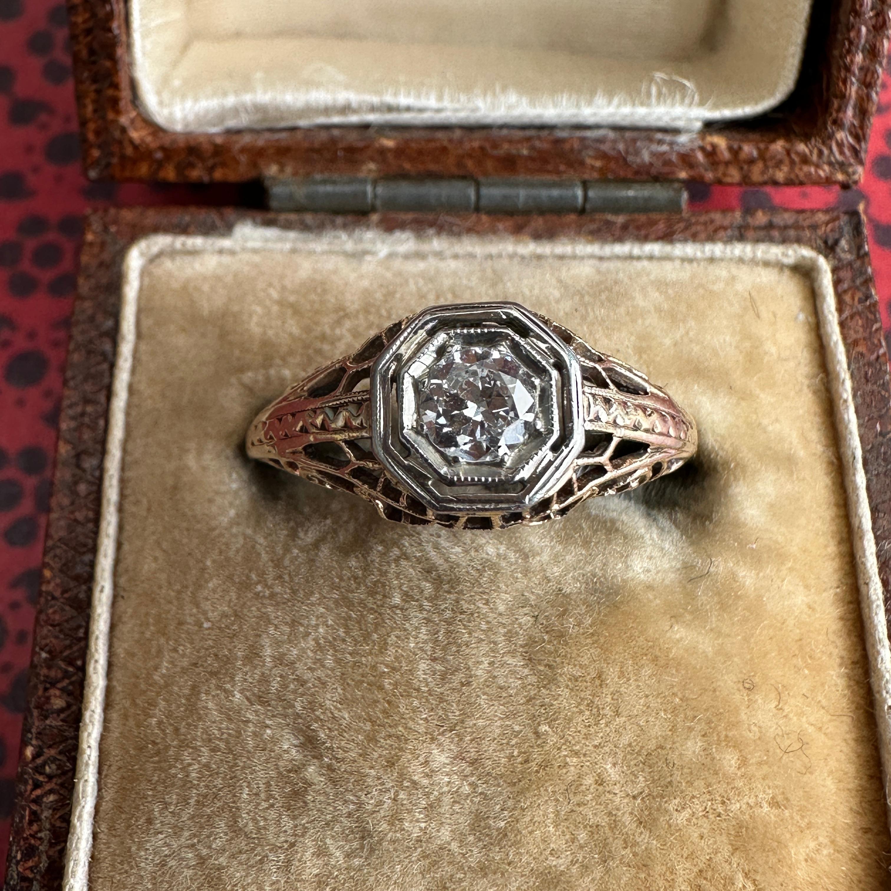 Details:
Lovely ring, that I am sure will sell fast! Edwardian 14K Gold Filigree in beautiful yellow gold, diamond is set in white gold. Dating back to the 1900's, it is rare to find these old filigree rings in yellow gold, as white gold was more