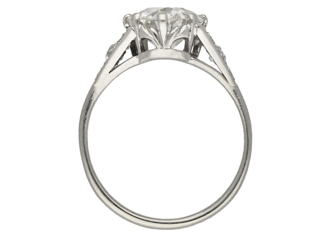 Old European Cut Edwardian diamond flanked solitaire ring, circa 1910.  For Sale