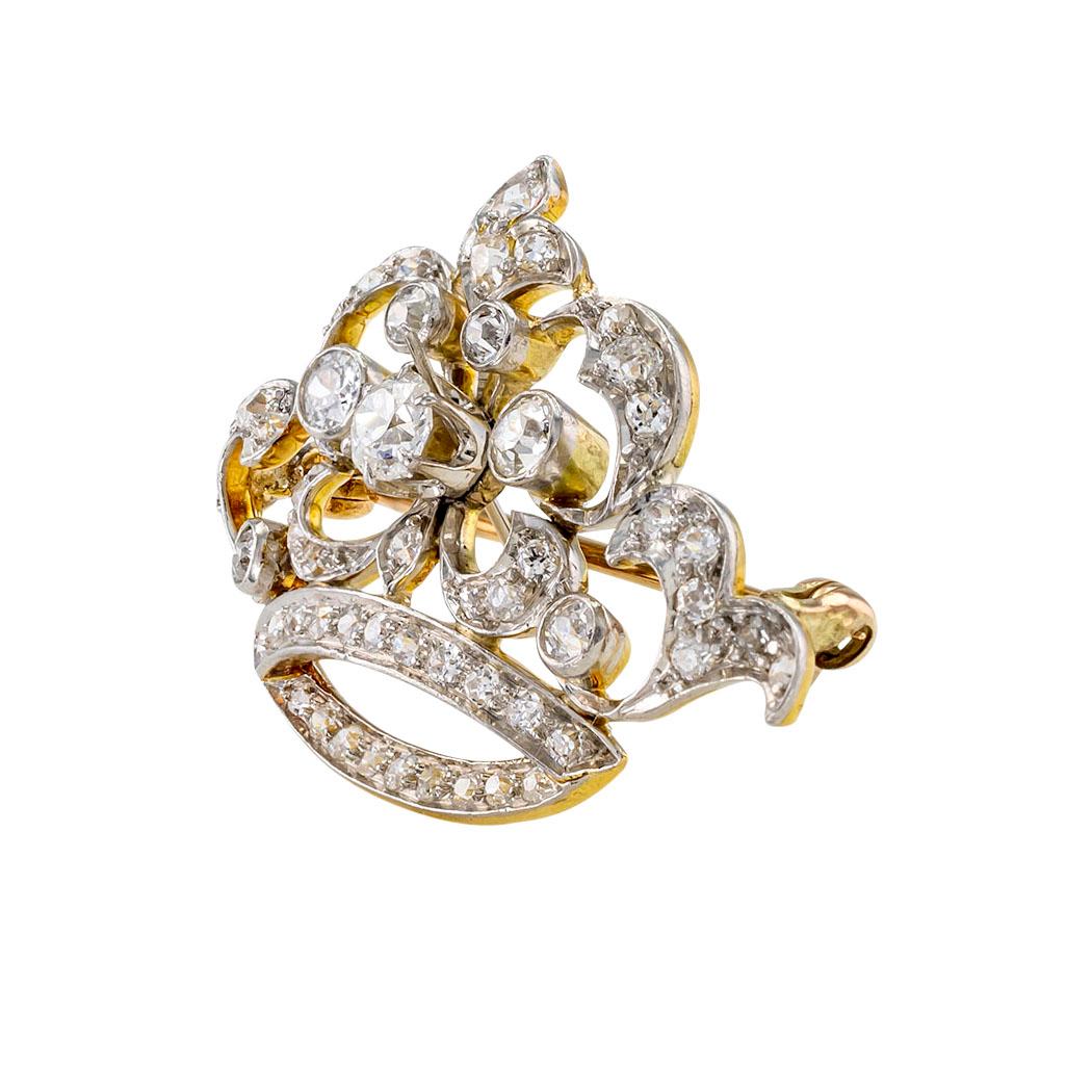 Edwardian diamond, gold, and platinum crown brooch circa 1910.

The facts you want to know are listed below.  Read on.  It is all remarkably short, simple, and clear.

Contact us right away if you have additional questions. 

We are here to connect
