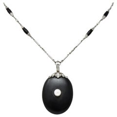 Edwardian Diamond Natural Pearl Onyx Platinum Long Chain Necklace, circa 1910