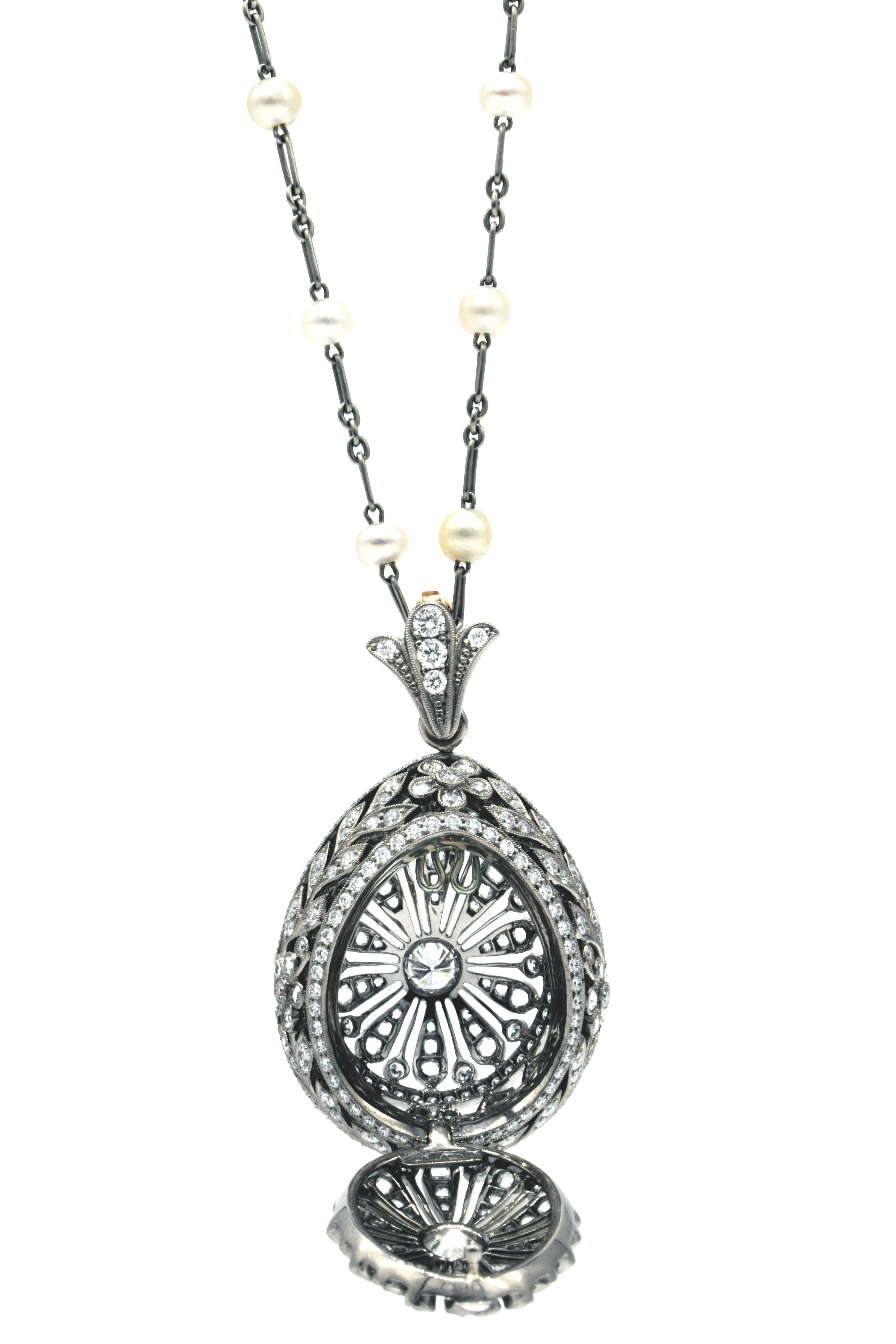 
Edwardian Diamond Open Egg Pendant Locket Necklace, Chavana Collection

One of the CHAVANA collection  called Oeuf d’enchantement 

 Most lives on earth begin with an egg. 
It is the biological capsule which protects and embraces the unborn, and