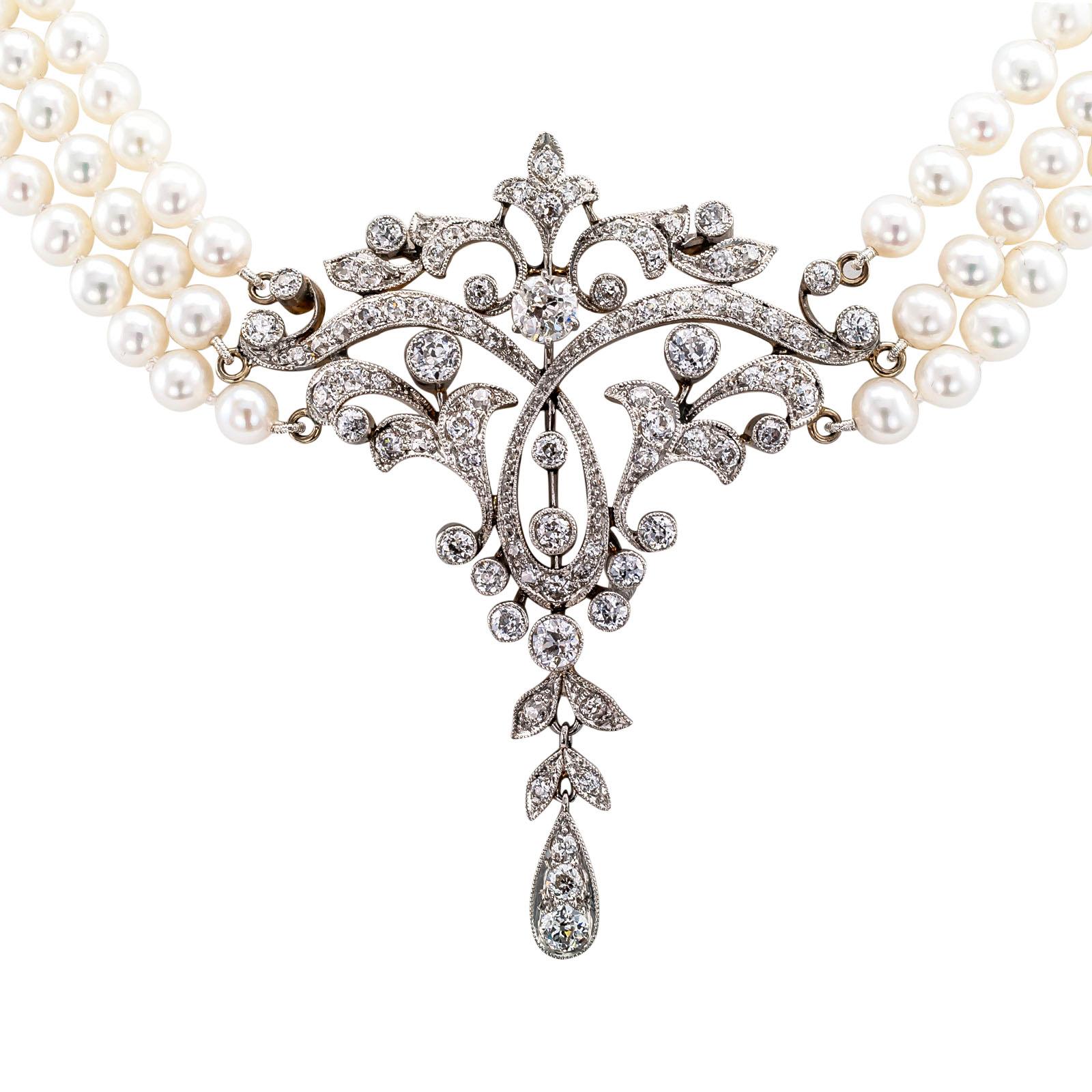 Edwardian diamond pearl gold and platinum necklace circa 1910.

DETAILS:

DIAMONDS: eighty-four circular diamonds totaling approximately 4.50 carats, approximately H – K color and SI – I clarity.

GEMSTONES: cultured pearls measuring 4.5 – 5