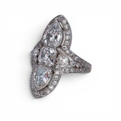 Edwardian Diamond, Platinum and Gold Three Stone Plaque Ring, Circa 1910
