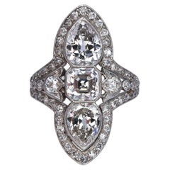 Edwardian Diamond, Platinum and Gold Three Stone Plaque Ring, Circa 1910