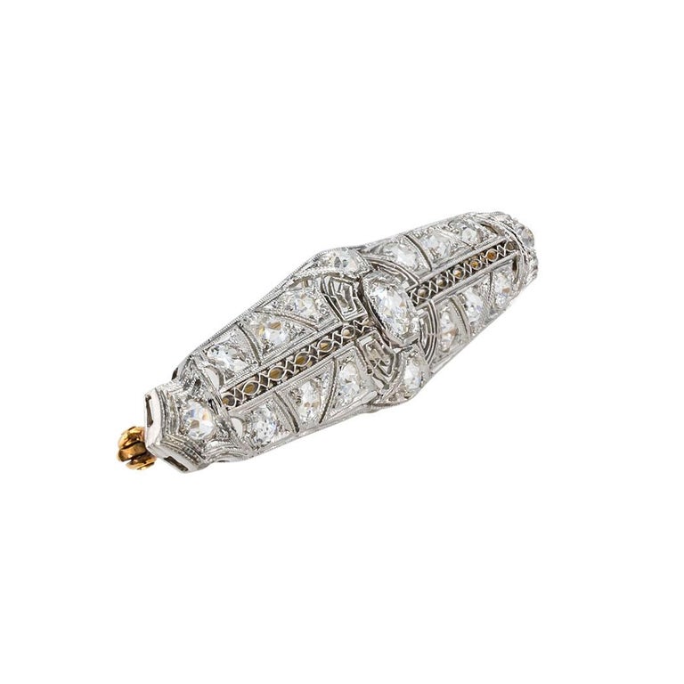 Edwardian diamond platinum and gold bar brooch circa 1910.  Clear and concise information you want to know is listed below.  Contact us right away if you have additional questions.  We are here to connect you with beautiful and affordable