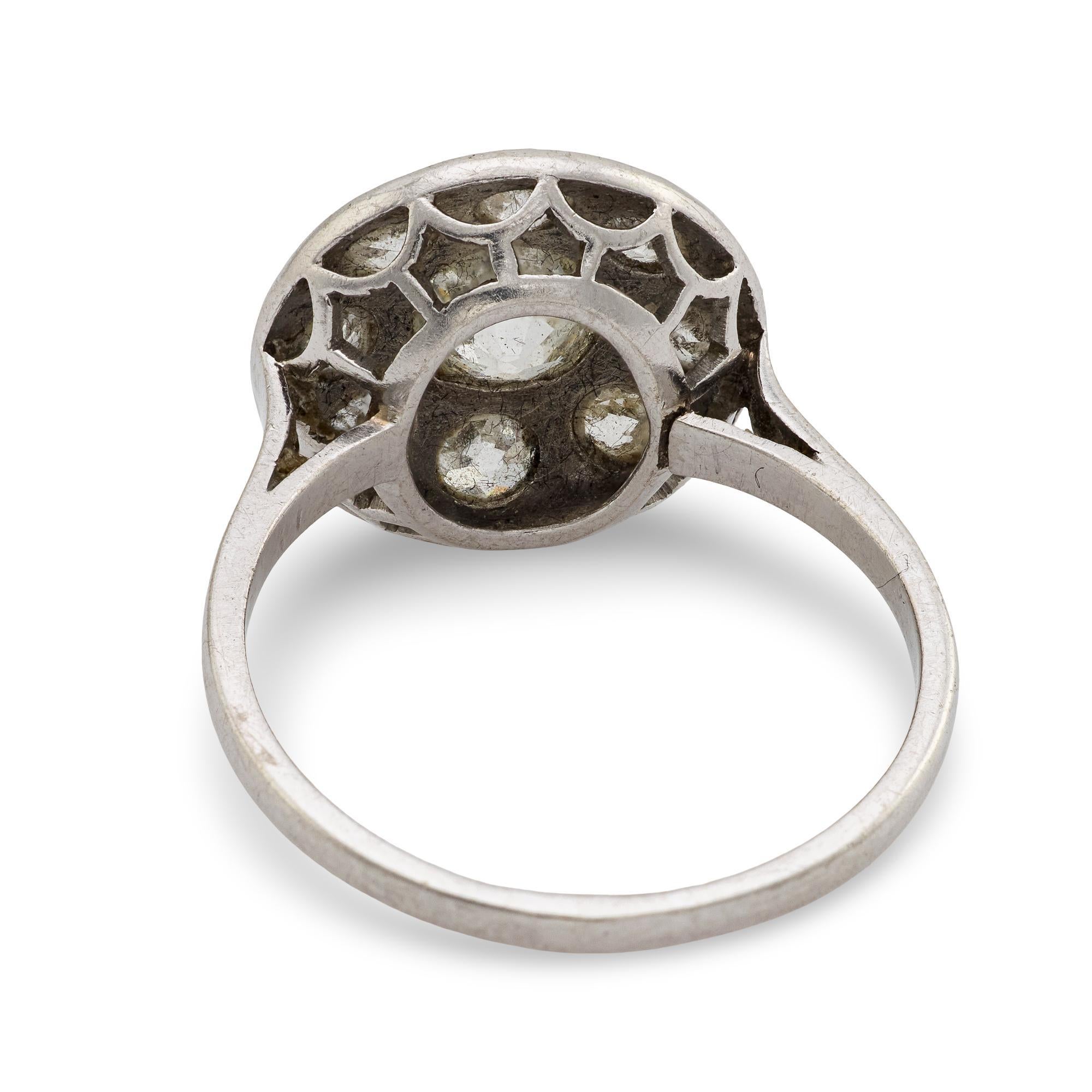Women's Edwardian diamond platinum cluster engagement ring For Sale