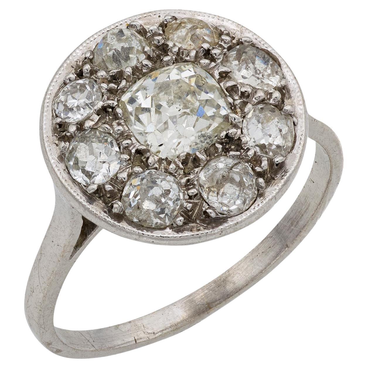 Edwardian diamond platinum cluster engagement ring For Sale
