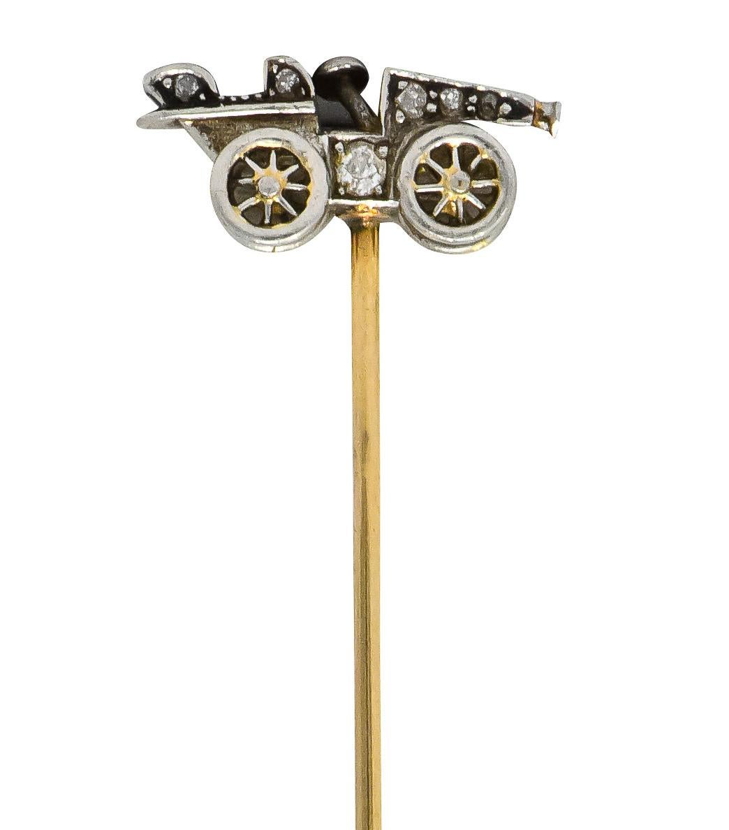 Designed as an antique car

Accented with old European, Swiss and single cut diamonds, total diamond weight approximately 0.10 carat, eye-clean and white

Tested as Platinum with gold pin stem

Car Measures: Approx. 3/4 x 1/4 Inch

Total Length:2