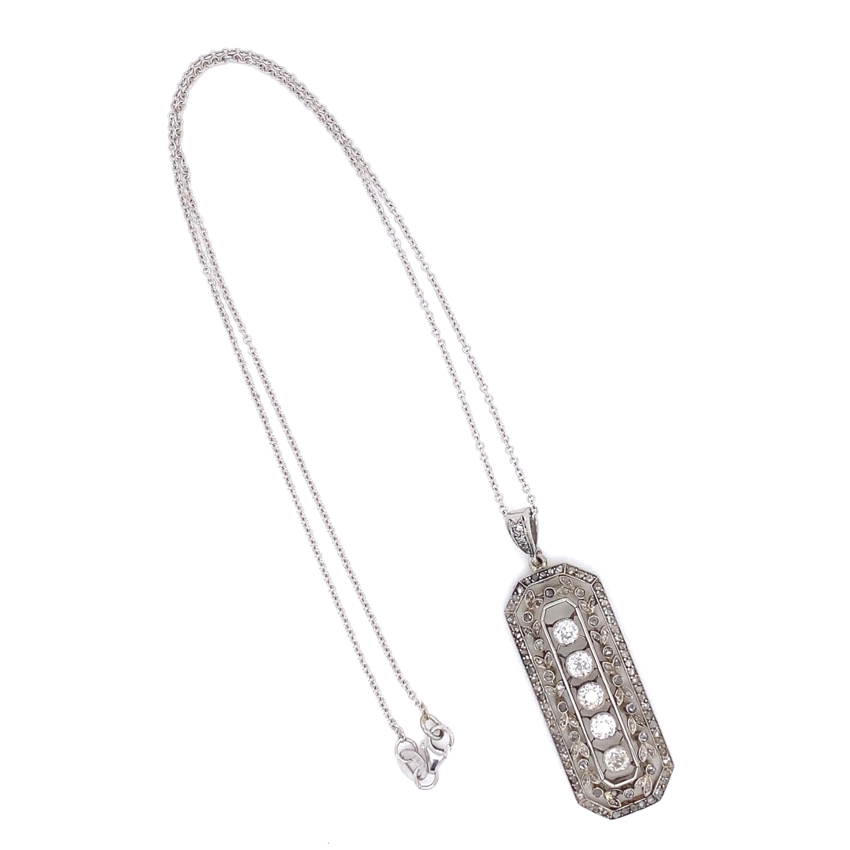 Simply Beautiful! Elegant and finely detailed Edwardian Diamond Pendant Necklace. Hand set with Diamonds, weighing approx. 2.00tcw. Pendant measures approx. 1.82” L x 0.58i” W x 0.17” H. Suspended from a 14K White Gold Chain, approx. 16” long.