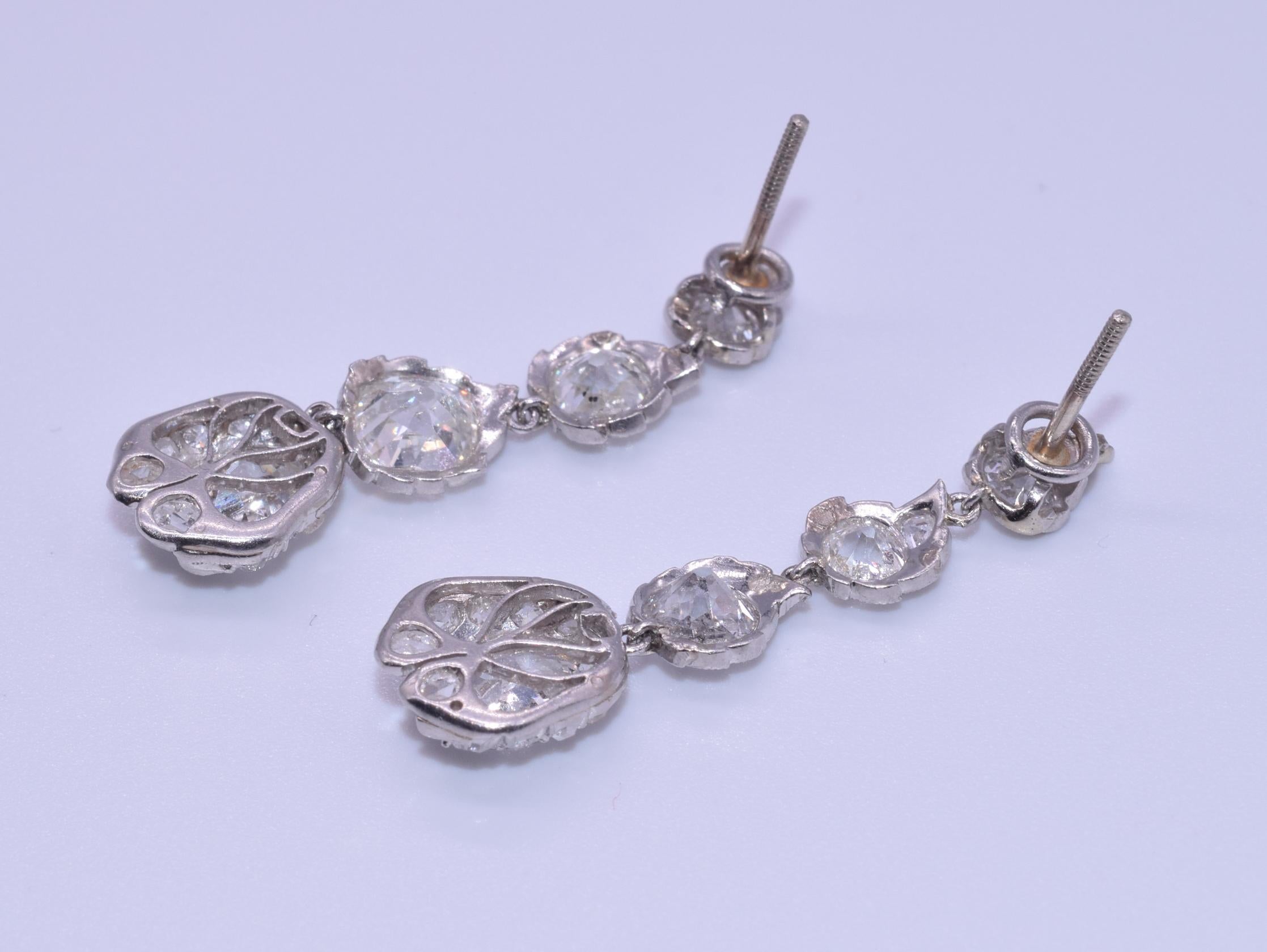 Edwardian Diamond Platinum Stylized Flower Bud Pendant Earrings In Excellent Condition For Sale In New York, NY