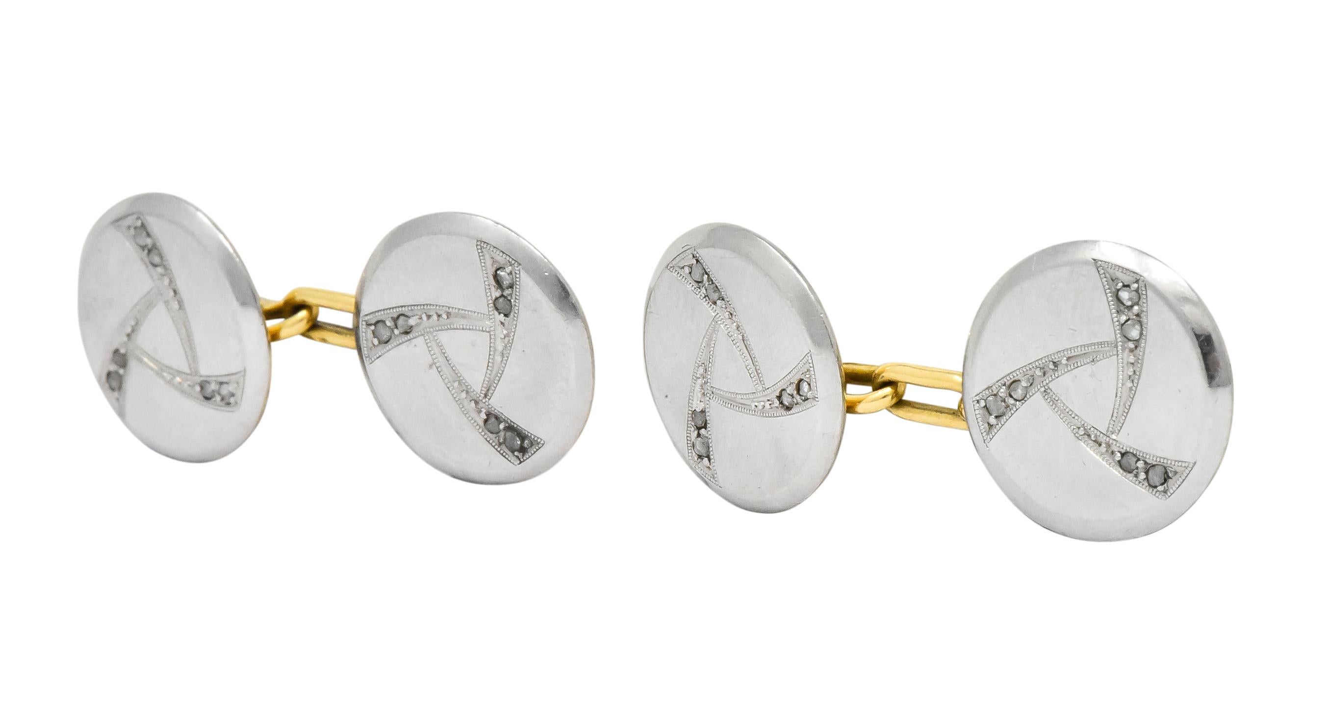 High polished platinum-topped gold round disks with a beveled edge

Each centering pinwheel motif with tiny rose cut diamonds

Chain link style cufflinks

Tested as 18 karat gold and platinum

Circa 1910

Diameter: 14.0 mm

Total Weight: 10.9 Grams