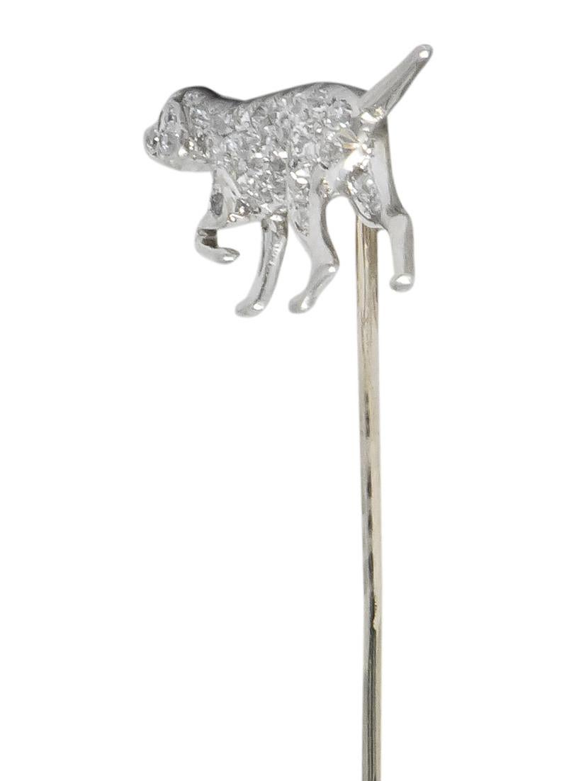 Designed as an English Pointer, in full point position

Pavé set with single cut diamonds, weighing approximately 0.50 carat total, eye-clean and white

With tiny round cut ruby eye

Tested as platinum with white gold pin stem

Dog Measures: 1/2 x 1