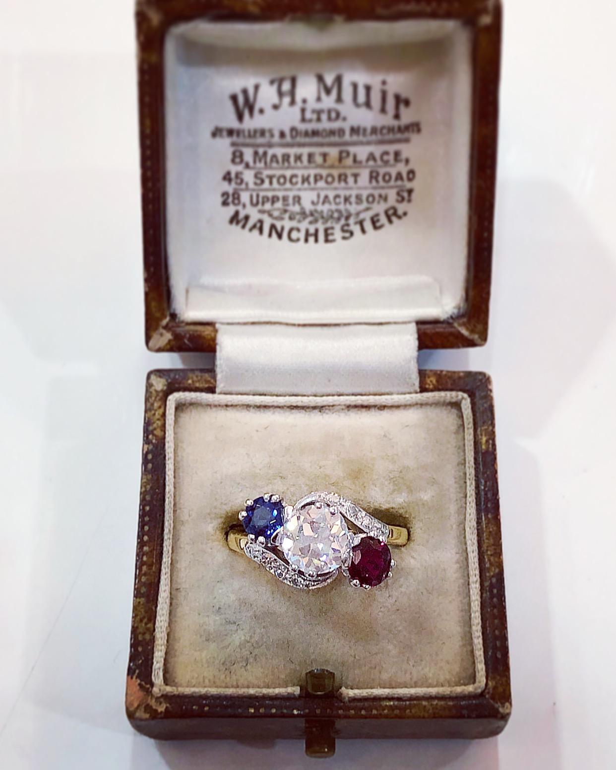 Edwardian Diamond, Sapphire and Ruby Three-Stone Twist Ring, circa 1910 2