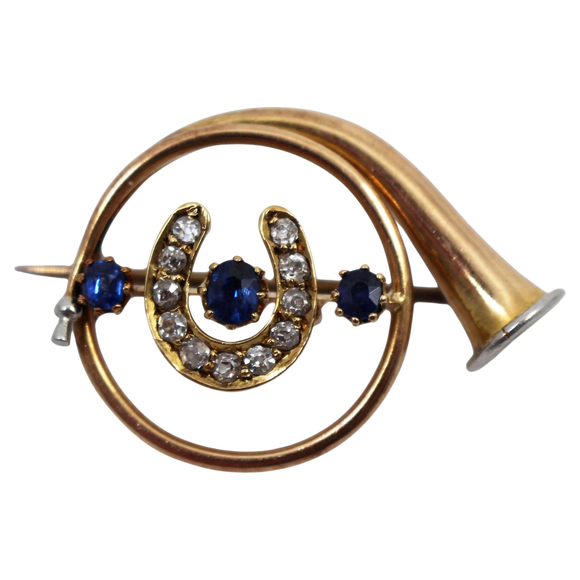 Spilla da caccia in oro con diamanti e zaffiri di Edwardian Horn in vendita