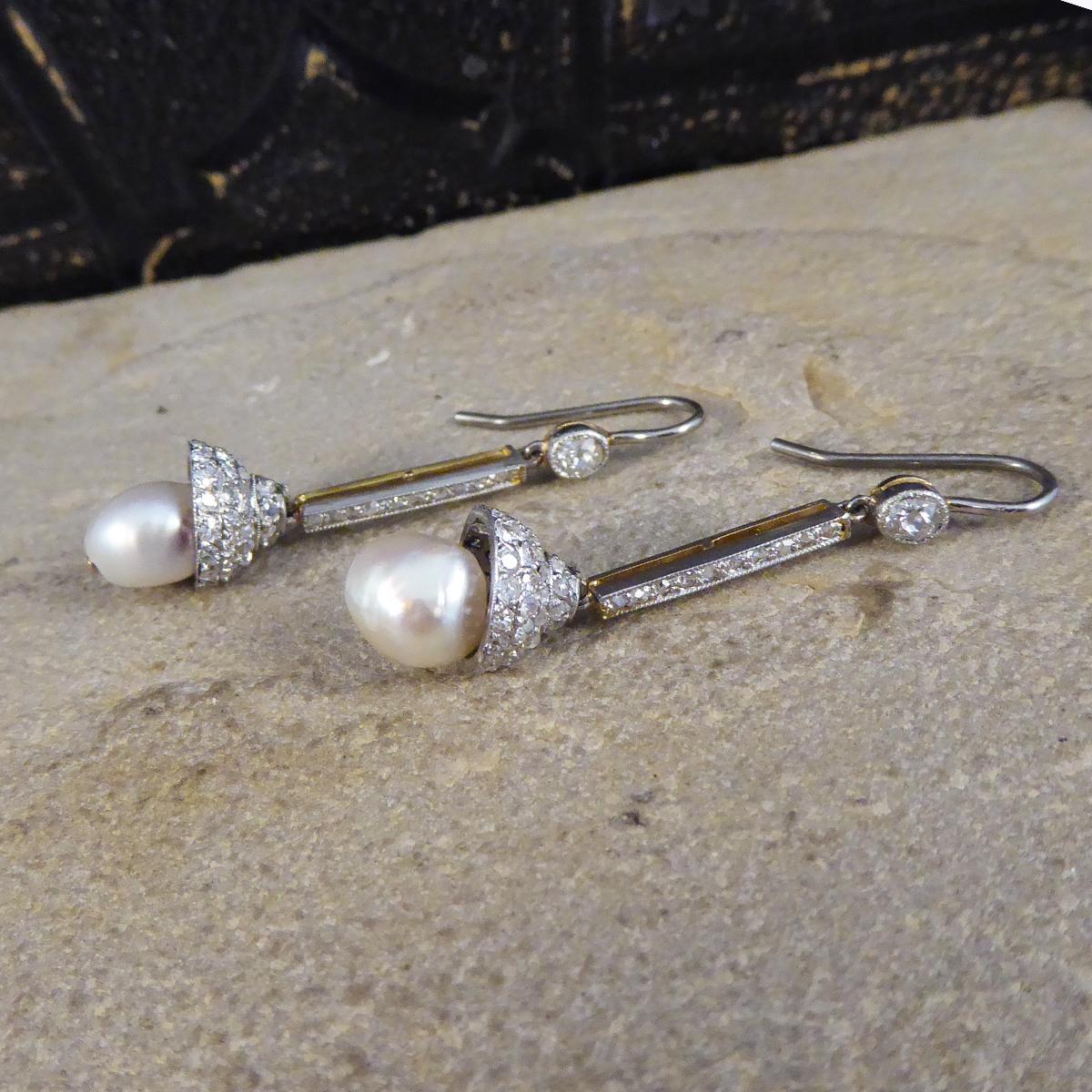 Absolutely perfect quality hand crafted Edwardian drop earrings. These earrings feature a single Natural Saltwater Pearl in each drop earring with very good lustre and GCS certificates for the Natural Pearls. There are old cut, rose cut and round