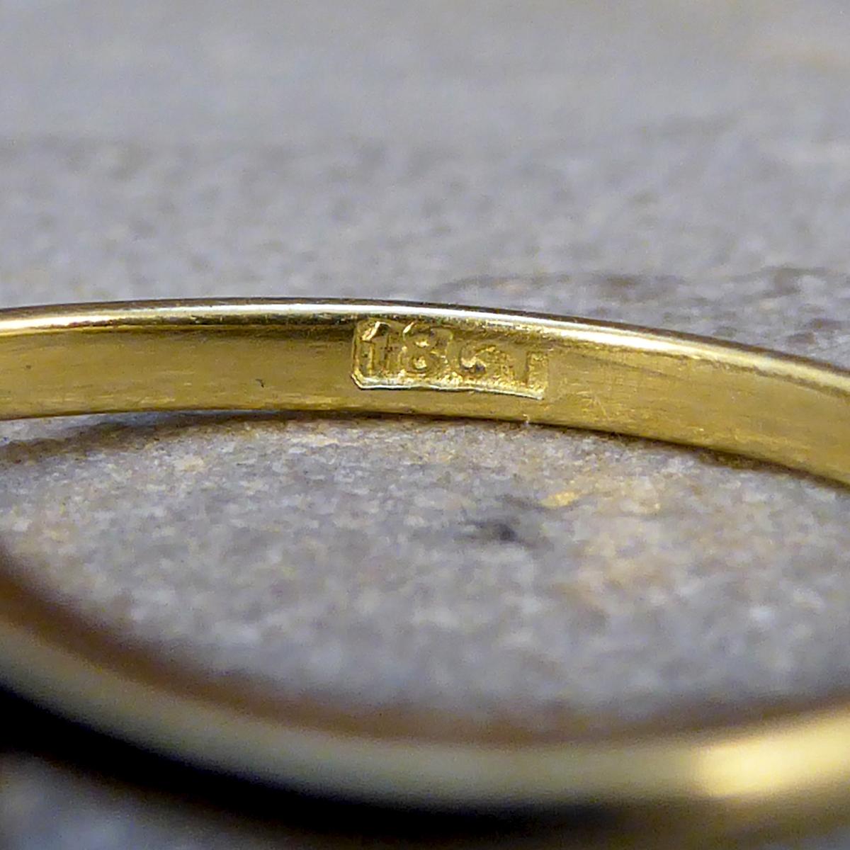 Round Cut Edwardian Diamond Three-Stone Twist Ring in 18 Carat Gold