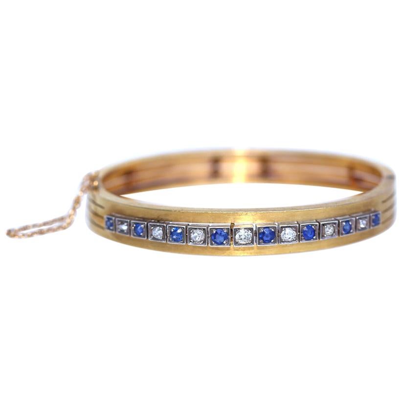 Edwardian Diamonds Sapphires Gold Bracelet Original Box, 1910
Edwardian bracelet of geometrical design with Diamonds and Sapphires. Created at the beginning of the 20th century. Seven Diamonds alternate with eight Sapphires slightly degrading in