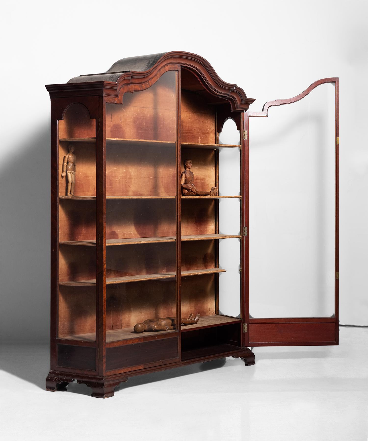 Elegant glass display cabinet with floating shelves and original velvet interior.




Measures: 64.25” W x 17.5” D x 83.5” H.
 