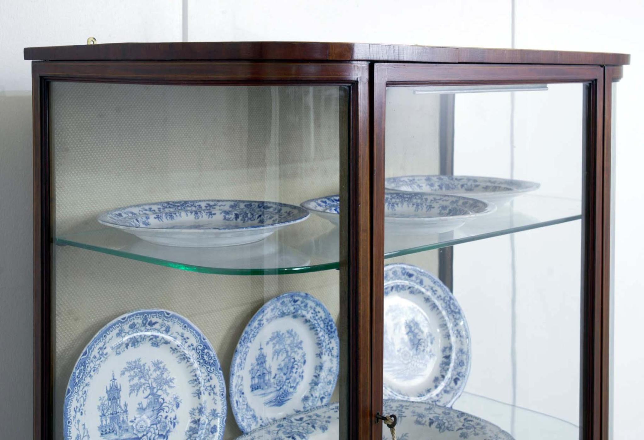You are viewing a period Edwardian display cabinet circa 1910
Mahogany construction with boxwood and satinwood line inlay, giving it a restrained but sophisticated decorative touch
Fully restored to original condition by our in house