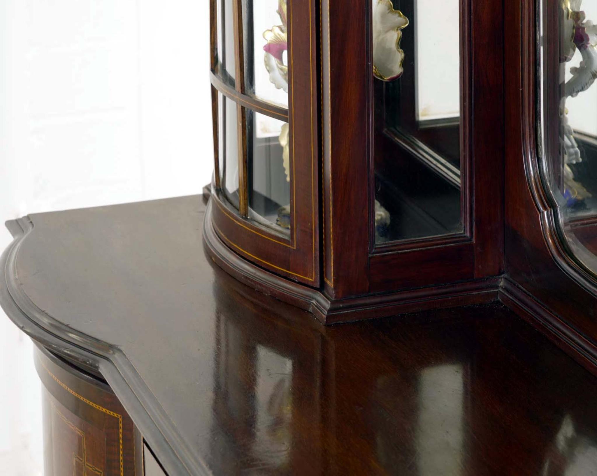 You are viewing a gorgeous Edwardian mahogany display sideboard Made by Maple & Co - please see makers stamp close up photo
Circa date 1910
Each cabinet has astragal-glazed doors with shelving inside, perfect for porcelain or glass