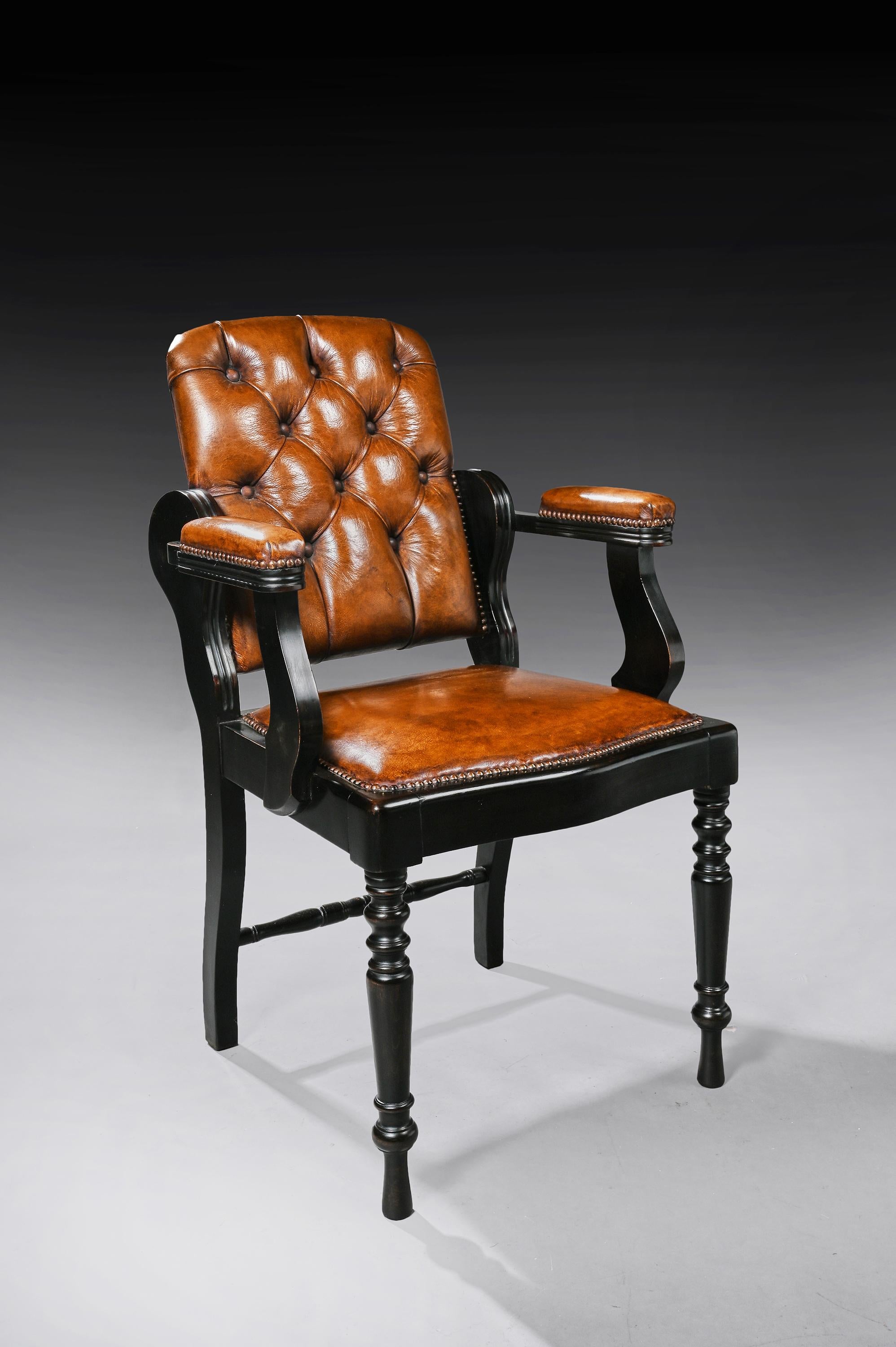 English Edwardian Ebonised and Leather Barbers Armchair