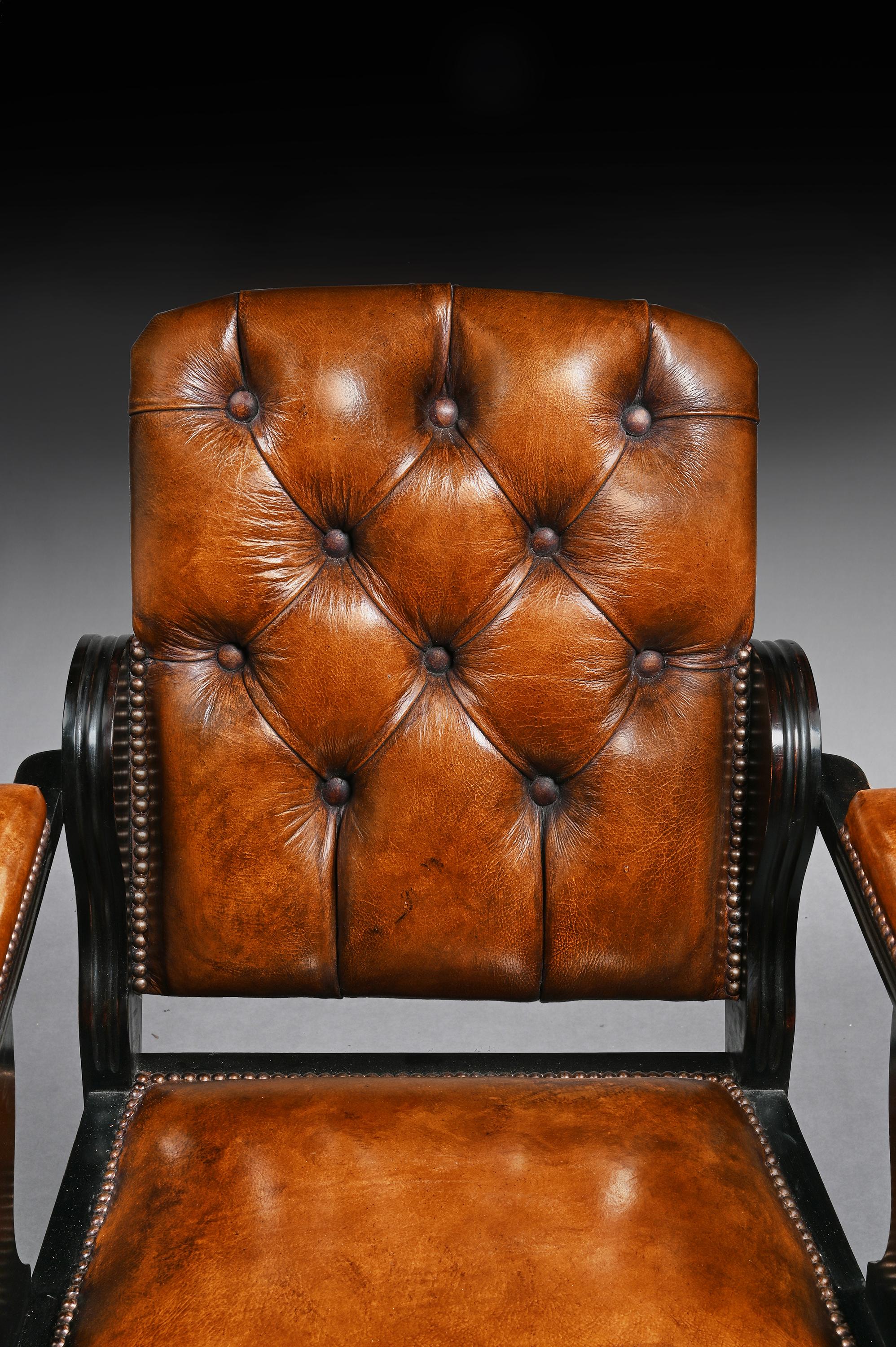20th Century Edwardian Ebonised and Leather Barbers Armchair